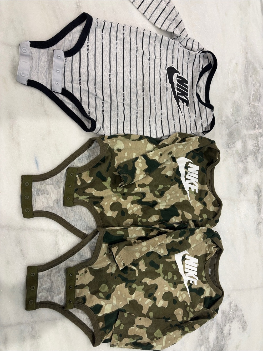 Baby boy Nike bodysuits